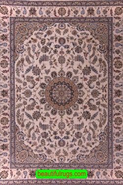 Nain design rug made in India with beige and brown colors. Size 9 x 12.2