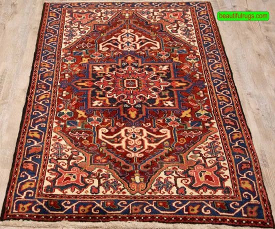 Small Persian Heriz rug with red color. Geometric pattern. Size 3.2x5