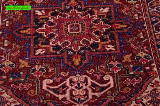 Small Persian Heriz rug with red color. Geometric pattern. Size 3.2x5