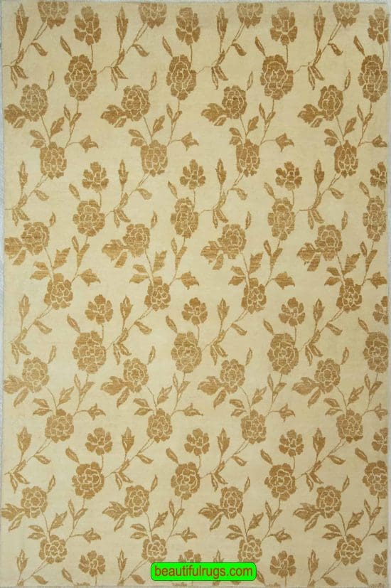 Floral modern rug from India, beige color with brown flowers. Size 6.4x8