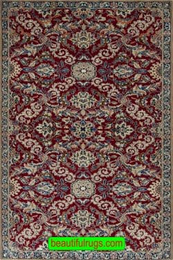 Persian Nain rug made of wool and silk in red color. Size 3.7x5.7