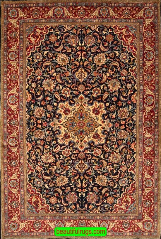 Floral Persian Sarouk rug with navy blue and red color. Size 4.10x7.6