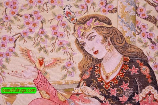 Handmade pure silk Persian Qum silk rug, woman is sitting on a rug with a bird in her hand. Size 2.7x4