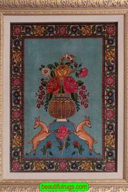 Handmade wall hanging rug. Antique Persian Tabriz wall rug in turquoise, two deers are holding a vase of flower. Size 1.10x2.6