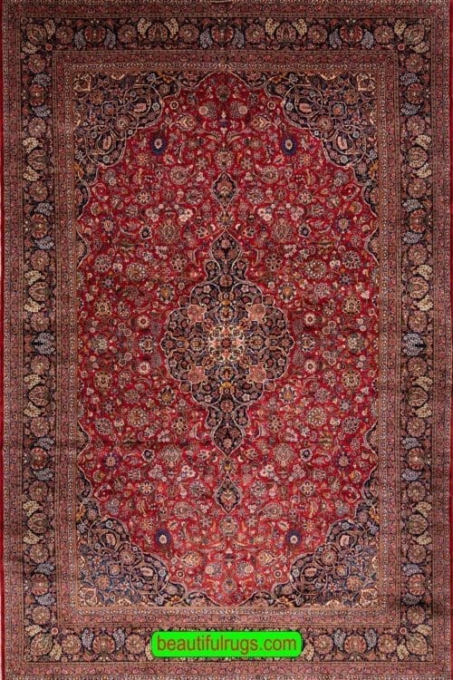 Antique Persian Kashan rug with red and navy-blue colors. Size11.5x18.2.