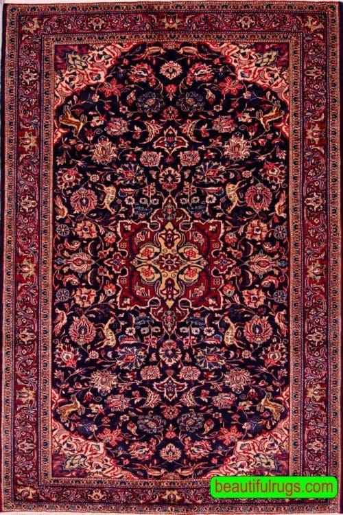 Persian sarouk rug with birds and animals, navy blue and red color. Size 4.6x7
