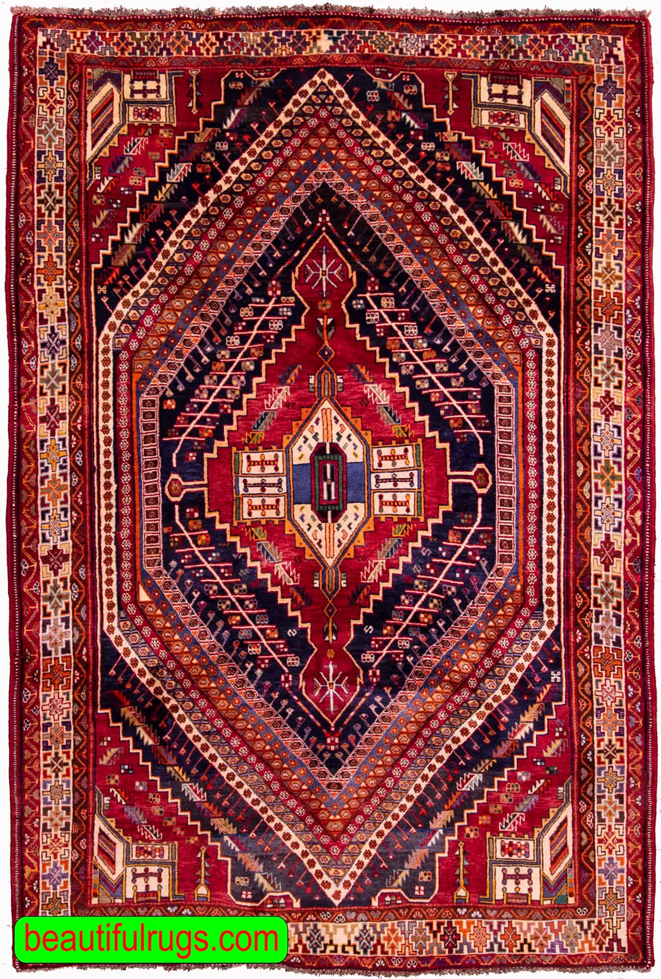 Geometric Persian Shiraz wool rug in red color. Size 6.3x9.2