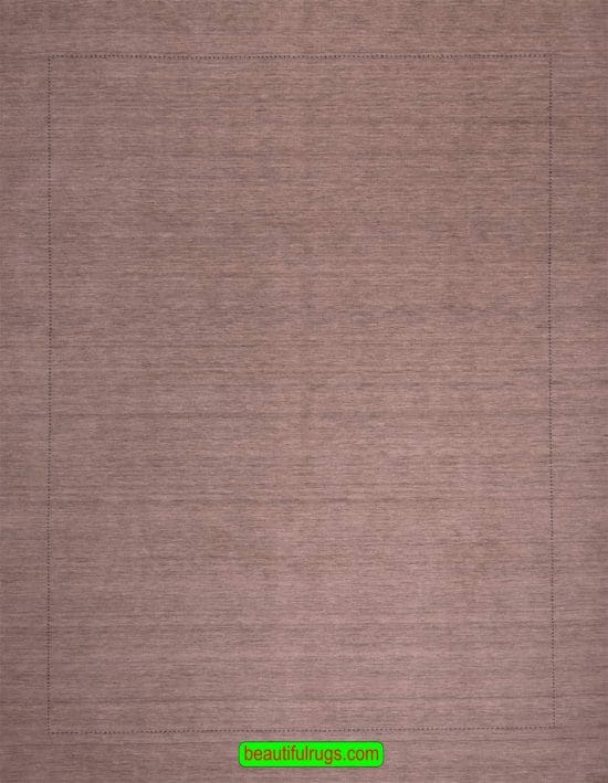 Plain color wool oriental beige color area rug. Size 8.4x9.10