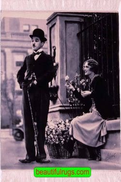 Handmade Persian Tabriz portrait of Charlie Chaplin and Virginia Cherrill, a scene of City Lights movie. Size 2.4x3