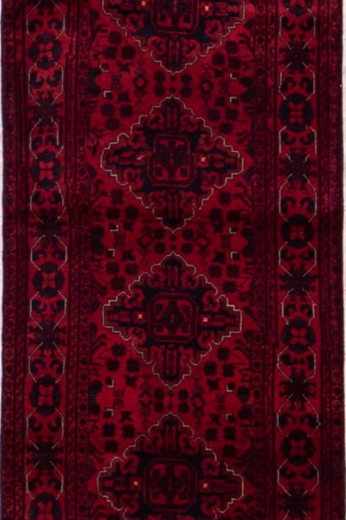 Red color traditional tribal runner rug made of wool. Size 2.8x12.6