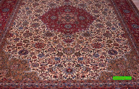 Handmade Persian Sarouk floral rug with beige color. size 8.6x10.6.