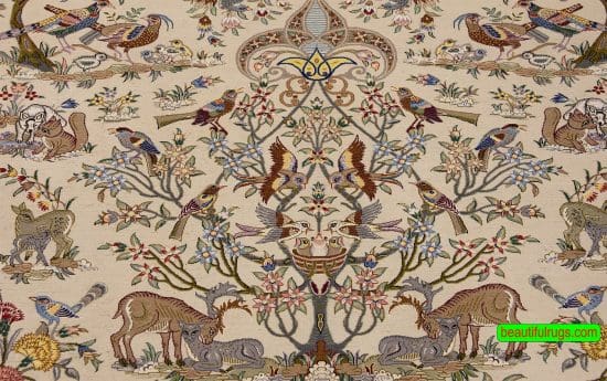 Persian Isfahan beige color rug, wool and silk rug with birds and animals. Size 7x9.9.