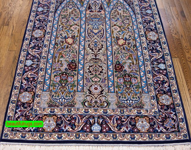 Pray rug with arch design and birds, blue and navy blue. Size 3.7x5.10