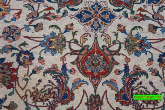Hand knotted Persian Tabriz rug with beige and green colors. Size 6.9x10.2