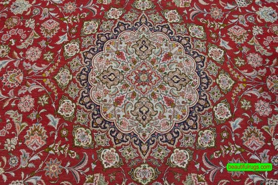 Wool and silk Persian Tabriz rug in red color. Size 8.3x11.8