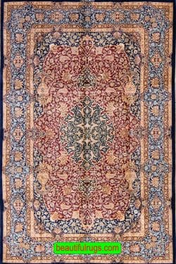 Persian silk rug with red and navy blue color. Size 5x8.7