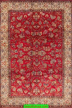 Persian Sarouk rug with red and beige color. Size 7x10.3.