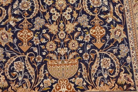 Esfahan carpets, navy blue wool and silk Esfahan carpet with flowers and birds. Size 3.10x6.