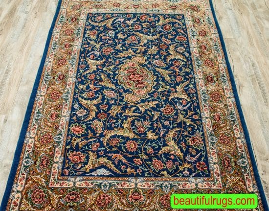 Hand knotted Esfahan carpet in blue and brown colors. Vegetable dyed kork wool and silk rug. Size 4x6.2.