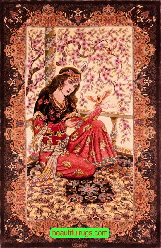 Handmade pure silk Persian Qum silk rug, woman is sitting on a rug with a bird in her hand. Size 2.7x4