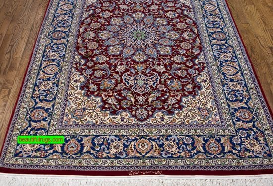 Handmade Persian Isfahan vegetable dye rug with red and blue colors. Size 4.10x7