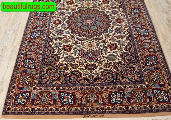 Traditional Persian Isfahan vegetable dyed rug in beige and red colors. Size 4.9x7.3