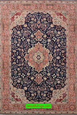 Hand knotted Persian Tabriz wool rug in navy blue and salmon color. Size 6.8x10.