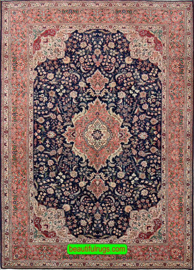 Hand knotted Persian Tabriz wool rug in navy blue and salmon color. Size 6.8x10.