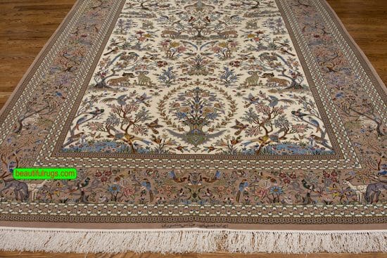 High quality Persian Isfahan rug with exotic birds and animals, beige and earth tone color. Size 6.6x10.