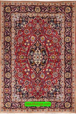 Handmade Persian Kashan carpet in red color. Size 3.6x5.2.