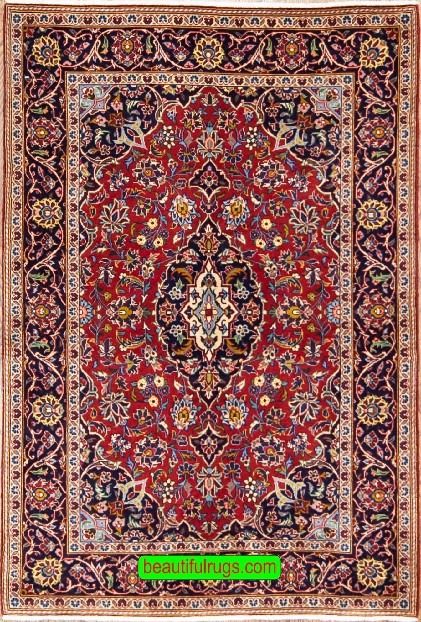 Handmade Persian Kashan carpet in red color. Size 3.6x5.2.