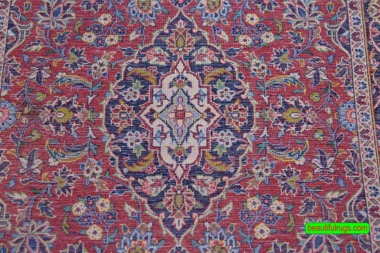 Handmade Persian Kashan wool rug in red color. Size 3.6x5.2.