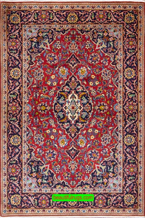 Handmade Persian Kashan wool rug in red color. Size 3.6x5.2.