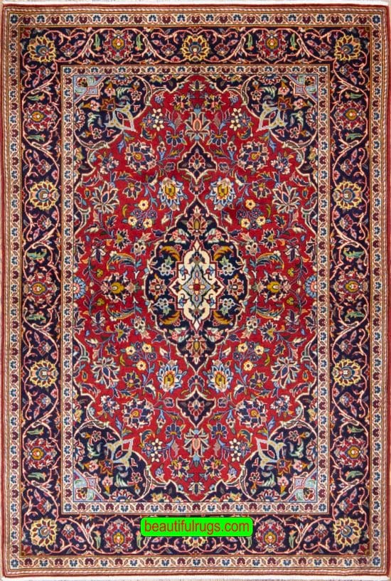 Handmade Persian Kashan wool rug in red color. Size 3.6x5.2.