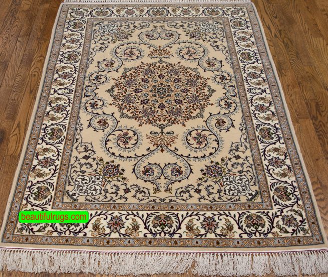 Persian Isfahan area rug in beige and taupe colors made of wool and silk. Size 3.8x5.7
