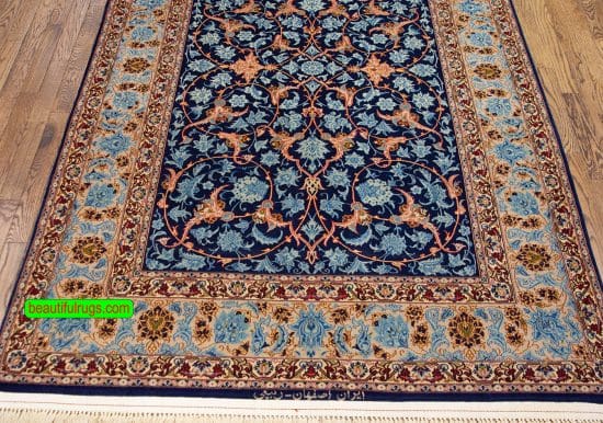 Old Persian Isfahan wool and rug in navy blue color. Size 4.7x7