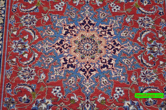 Hand knotted Persian Isfahan rug in red color, made of wool on silk foundation. Size 2.9x4.2