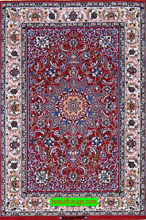 Hand knotted Persian Isfahan rug in red color, made of wool on silk foundation. Size 2.9x4.2