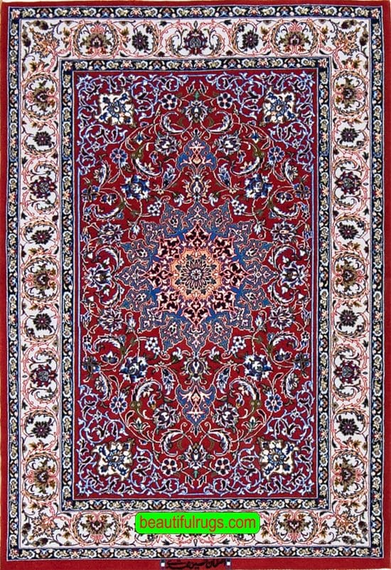 Hand knotted Persian Isfahan rug in red color, made of wool on silk foundation. Size 2.9x4.2