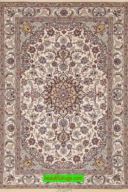 Handmade Persian Isfahan silk and wool rug in beige and earth tone colors. Size 2.9x4.6.