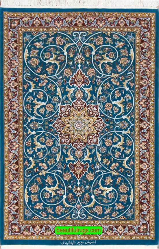 Handmade Persian Isfahan kork wool and silk rug in blue color. Size 3x4.5.