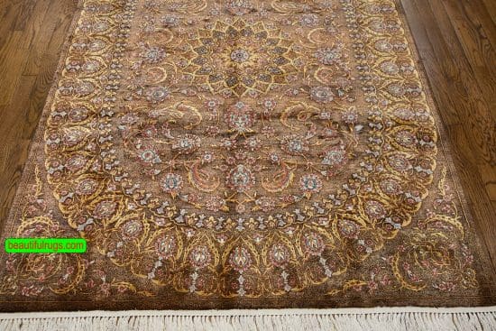 Handmade brown Persian silk rug with brown and gold colors. Size 4.4x6.9.