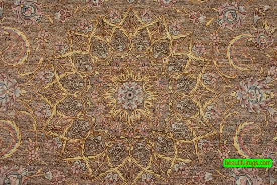 Handmade brown Persian silk rug with brown and gold colors. Size 4.4x6.9.