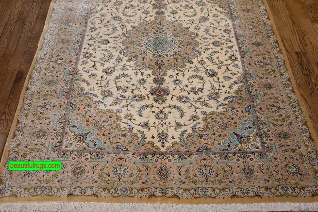 Pure silk Persian Kashan rug in beige and earth tone colors. Size 4.6x6.8.