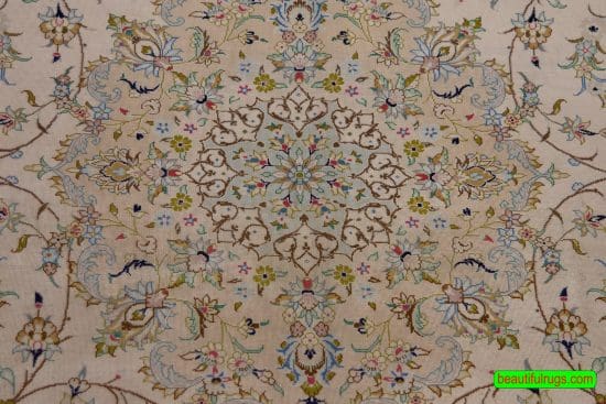 Pure silk Persian Kashan rug in beige and earth tone colors. Size 4.6x6.8.