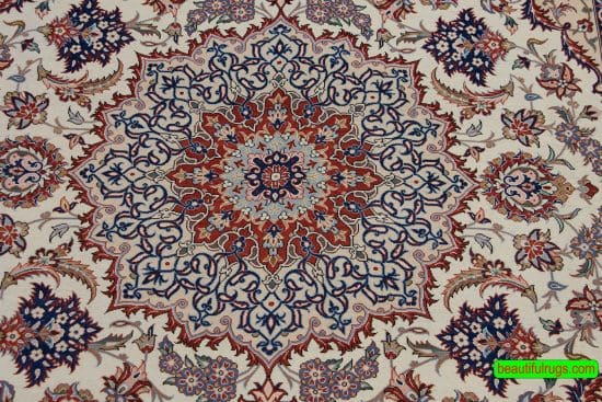 High quality Persian Isfahan vegetable dyed kork wool and silk rug in beige color. Size 4.9x7.3.