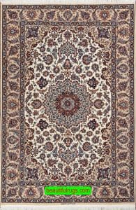 High quality Persian Isfahan vegetable dyed kork wool and silk rug in beige color. Size 4.9x7.3.