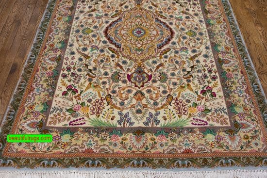 Multicolor handmade Persian Tabriz rug with birds and flowers. Size 5x7.2.