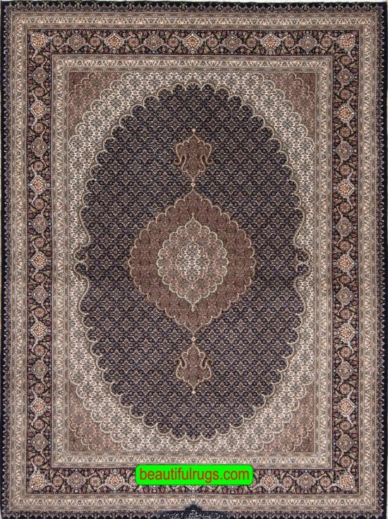 Intricately woven wool and silk black color Persian Tabriz rug for sale. Size 5.3x7.