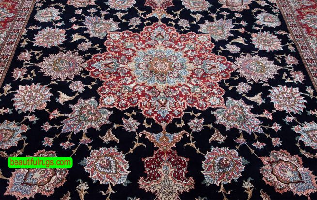 Persian Tabriz rug with black and red colors. Size 8.4x11.7.